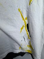 Load image into Gallery viewer, Avant-Garde Distressed Shirt with Artistic Yellow Paint Accents
