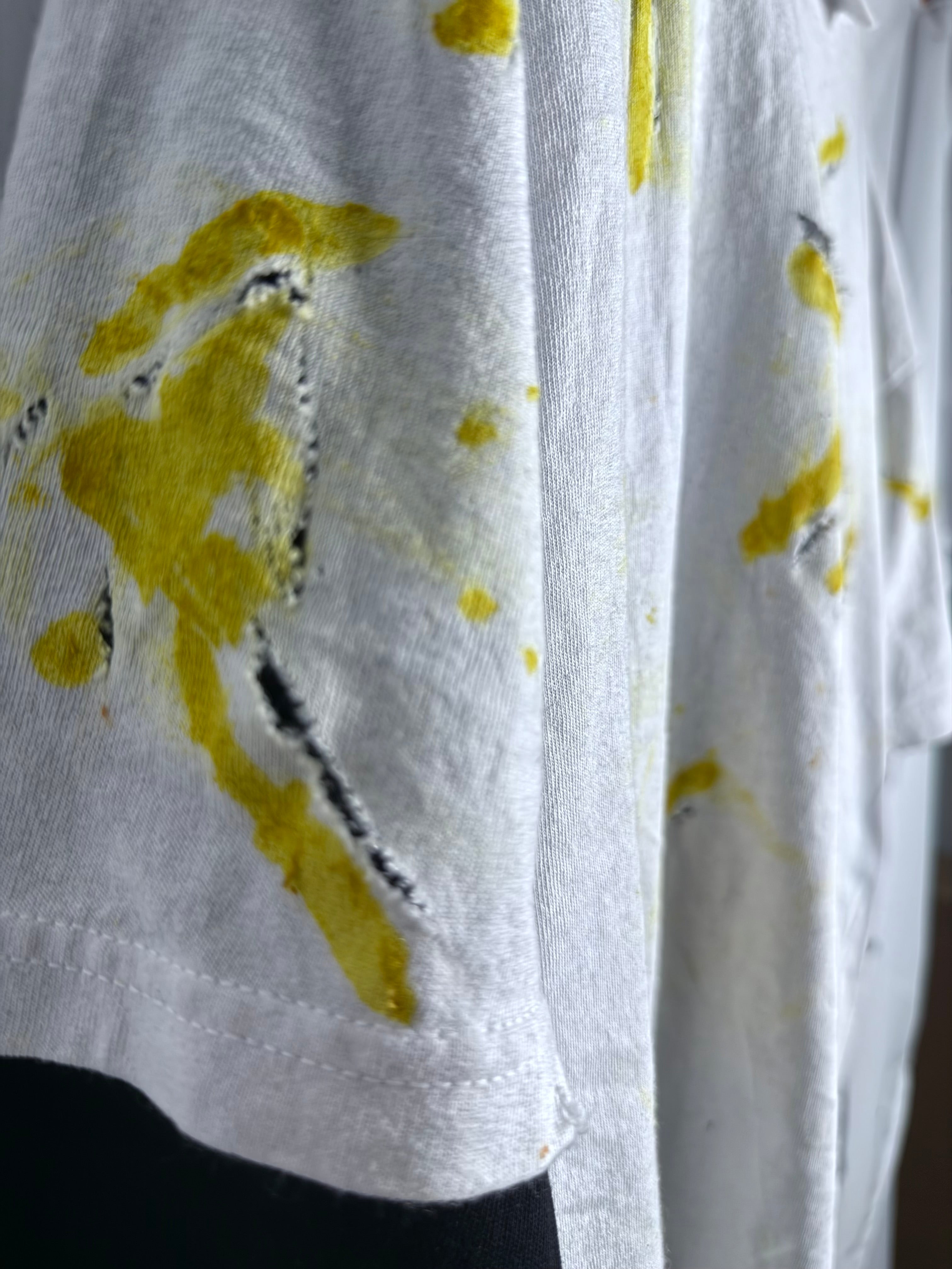 Avant-Garde Distressed Shirt with Artistic Yellow Paint Accents